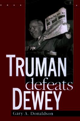 TRUMAN DEFEATS DEWEY